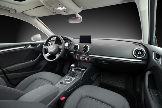 studio shot passenger car interior, front view