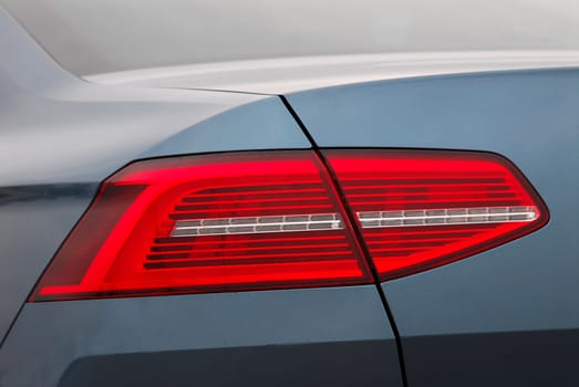 the tail lights on a luxury passenger car
