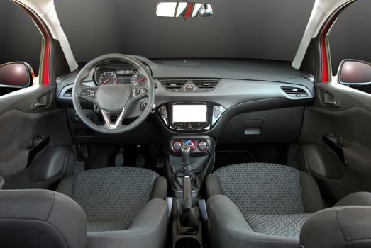 studio shot passenger car interior, front view