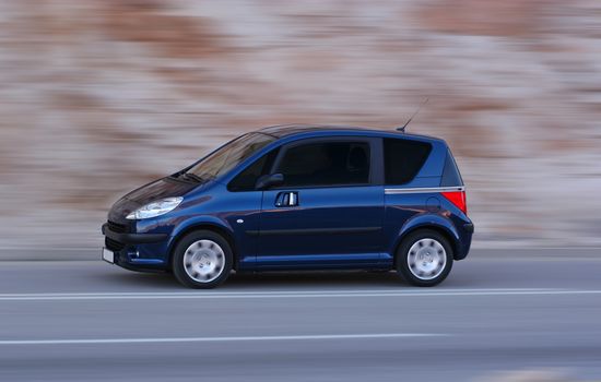 passenger van photographed at high speeds