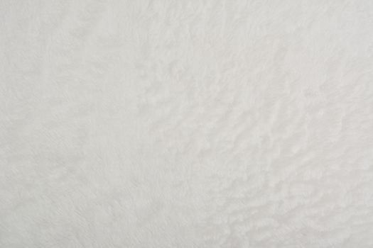 Abstract Artificial texture fur fabric, background, closeup. Fluffy material backdrop, kids toys faux fur.