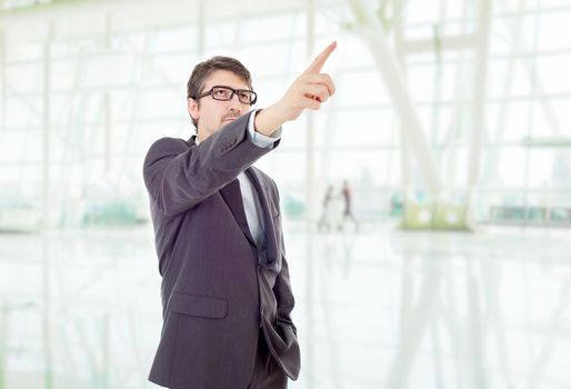 young business man pointing, at the office