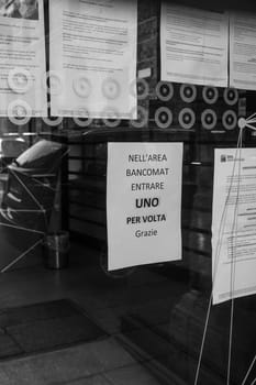 Cremona, Lombardy, Italy - April 30 th - May 1st 2020 - closed bars  and general commerce  during coronavirus lockdown and economic crisis. Italian signs