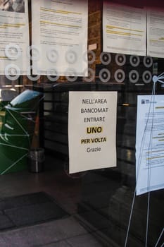 Cremona, Lombardy, Italy - April 30 th - May 1st 2020 - closed bars  and general commerce  during coronavirus lockdown and economic crisis. Italian signs