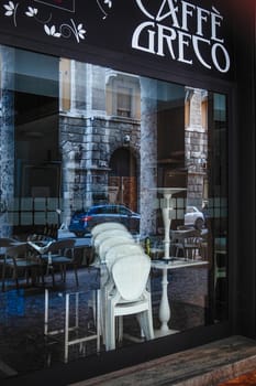 Cremona, Lombardy, Italy - April 30 th - May 1st 2020 - closed bars  and general commerce  during coronavirus lockdown and economic crisis. Italian signs