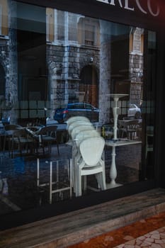 Cremona, Lombardy, Italy - April 30 th - May 1st 2020 - closed bars  and general commerce  during coronavirus lockdown and economic crisis. Italian signs