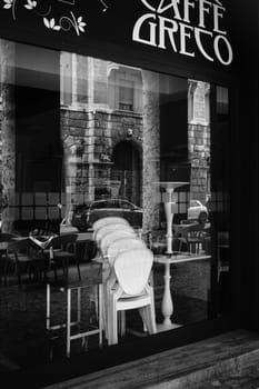 Cremona, Lombardy, Italy - April 30 th - May 1st 2020 - closed bars  and general commerce  during coronavirus lockdown and economic crisis. Italian signs