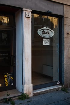 Cremona, Lombardy, Italy - April 30 th - May 1st 2020 - closed bars  and general commerce  during coronavirus lockdown and economic crisis. Italian signs