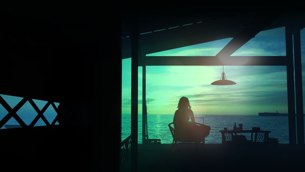 Silhouette of a girl sitting in her bungalow by the sea after sunset.