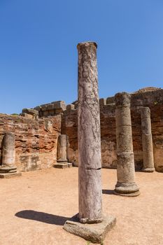 Old roman columns in the antique theater in Merida, Spain