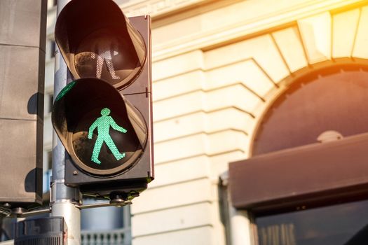 Traffic light on green in sunlight