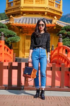 Woman in Front View The Golden Pavilion Temple in Nan Lian Garden