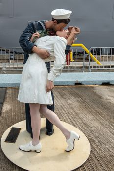 Oahu, Hawaii, USA. - January 10, 2020: Pearl Harbor. The Kiss or Unconditional Surrender statue where USS Missouri is docked. Kissing seaman and white dressed nurse.