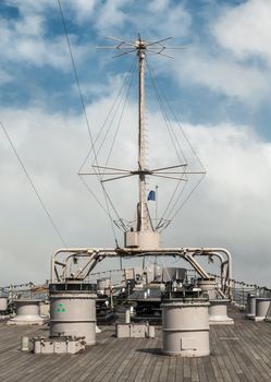 Oahu, Hawaii, USA. - January 10, 2020: Pearl Harbor. Deck above bow of USS Missouri Battle Ship under blue cloudscape.