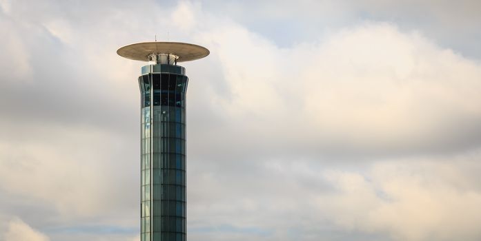 Roissy near Paris, France - October 08, 2017 : exterior view of the Airport traffic control tower south of Roissy Charles De Gaulle airport on a fall day