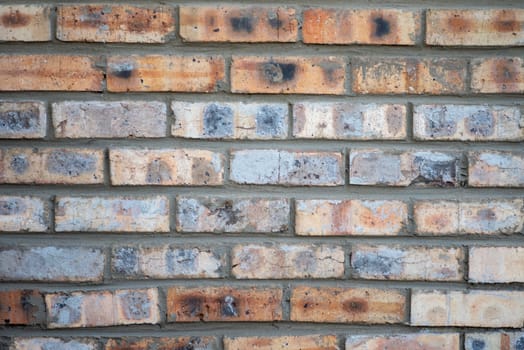 Bricks forming pattern on wall shot up close