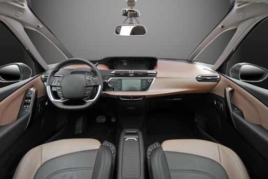studio shot passenger car interior, front view