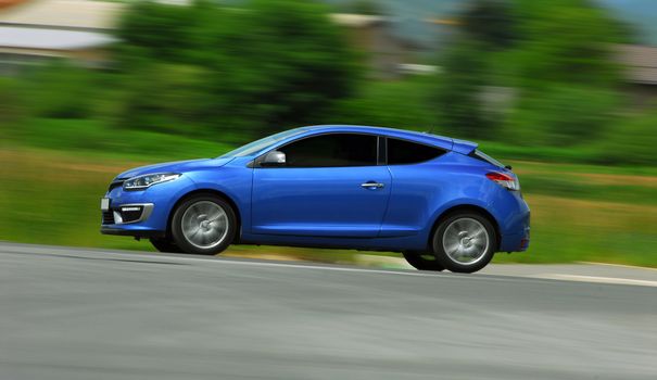 car photographed at high speeds