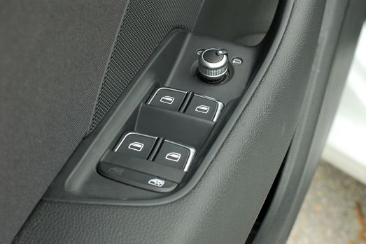 side mirror switch control, car interior detail