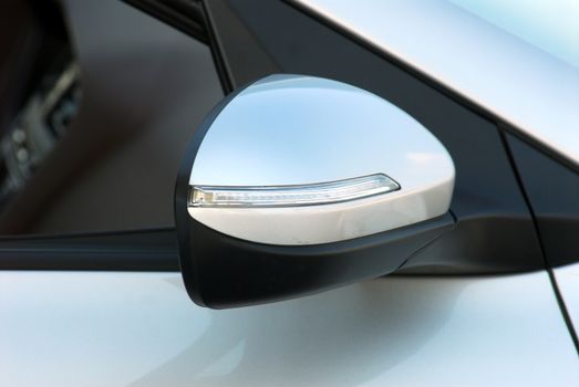 Side mirror with turn signal of a luxury car