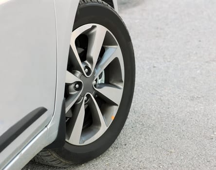 tire and alloy wheel on a car