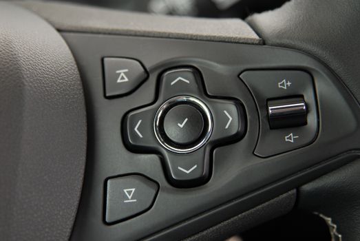 detail on the steering wheel with controls