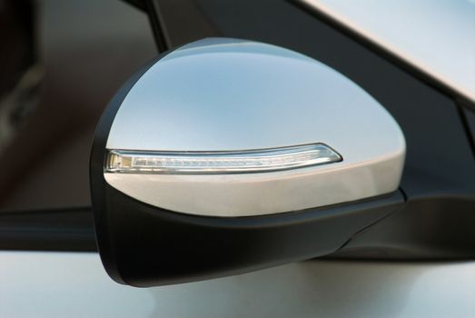 Side mirror with turn signal of a luxury car