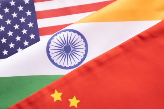 Concept of India, USA, and China relations showing with flags