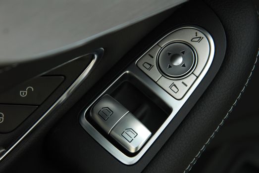 side mirror switch control, car interior detail