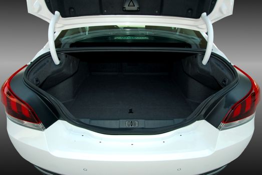 Empty trunk of the sedan, studio shot
