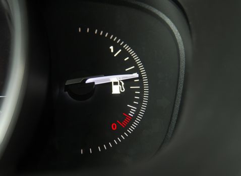 Close-up shot of a fuel gauge in a car