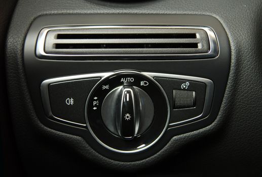 Closeup image of car lighting control switch