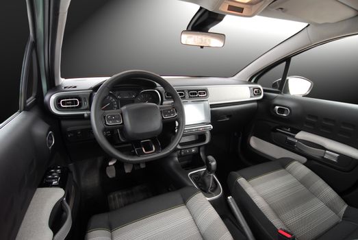 studio shot passenger car interior, front view