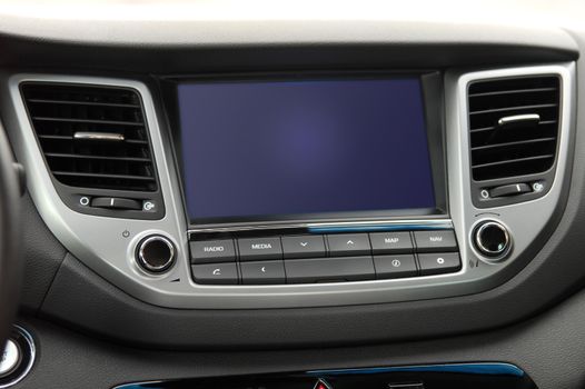 Modern car dashboard. Screen multimedia system. Interior detail