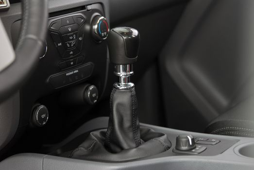 detail in the interior of the modern car, maual shift lever in the passenger car