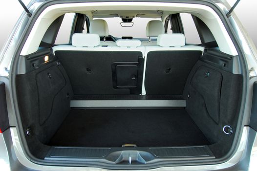Empty trunk of the small white suv