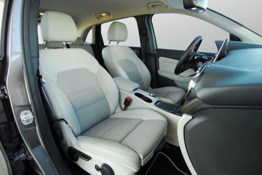 white front seats in a large passenger car