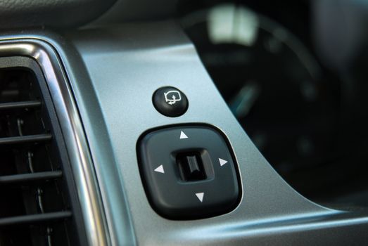 side mirror switch control, car interior detail