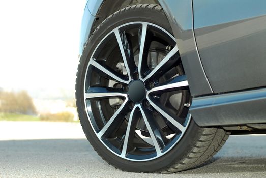 tire and alloy wheel on this small passenger car