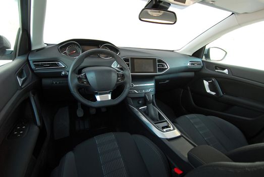 studio shot passenger car interior, front view