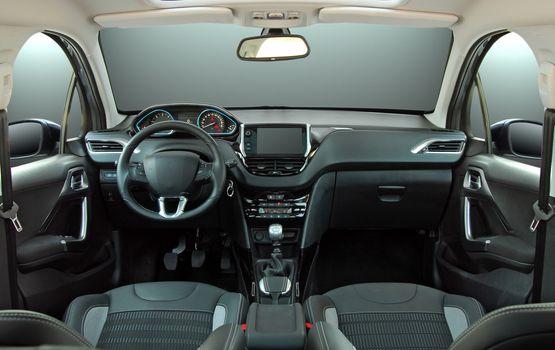 studio shot passenger car interior, front view