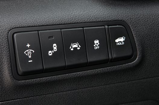 anel with buttons on the control panel of car