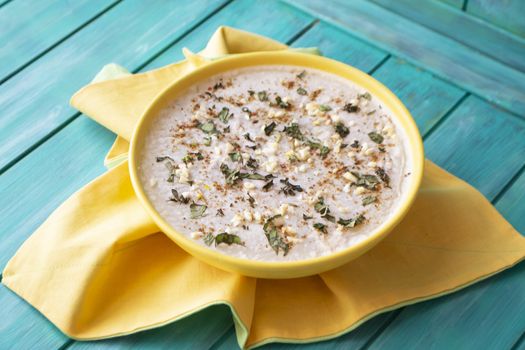 meat jelly on a plate with garlic and herbs, colorful image