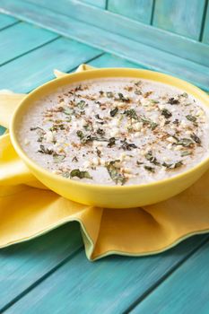 Jellied meat, traditional russian cuisine. Teal wooden background. Vertical image