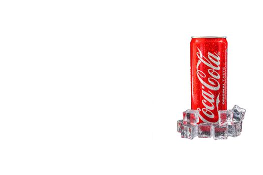 Kuala Lumpur, Malaysia - March 5, 2020 : Cola cola drink on white background. Coca Cola is competitor of Pepsi drink. Copy Space