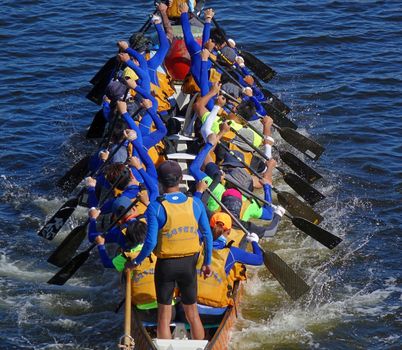 KAOHSIUNG, TAIWAN -- MAY 27, 2016: An unidentified team trains on the Love River in preparation for the upcoming Dragon Boat Festival.