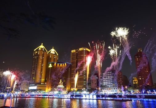 KAOHSIUNG, TAIWAN -- FEBRUARY 3, 2017: To celebrate the Chinese year of the Rooster fireworks are on display along the banks of the Love River during the traditional Lantern Festival.