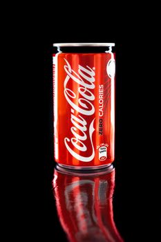 Kuala Lumpur, Malaysia - March 5, 2020 : Cola cola or Coke drink on black background. Coca Cola is competitor of Pepsi drink. Copy Space