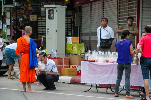 NAN,THAILAND - JULY 19,2016  : The monk walked alms in the morning.