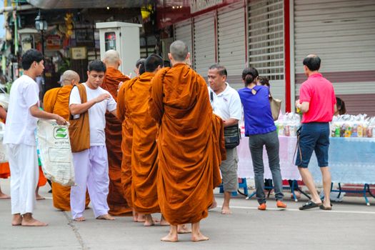 NAN,THAILAND - JULY 19,2016  : The monk walked alms in the morning.